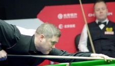 Джон Хигинс със срамно отпадане от "Чайна Оупън"