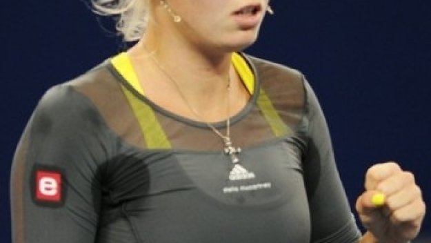 Возняцки спечели дълго отлагания финал в Пекин